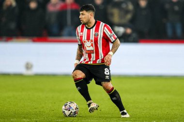 Sheffield United takımından Gustavo Hamer 12 Şubat 2025 'te Bramall Lane, Sheffield, İngiltere' de Sheffield United ve Middlesbrough maçında topla koşuyor.