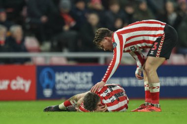 Sunderland 'dan Chris Rigg, 12 Şubat 2025' te İngiltere 'nin Sunderland şehrinde oynanan Sunderland-Luton Town maçında sakatlandı.
