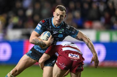 Wigan Warriors 'dan Harry Smith, 13 Şubat 2025' te Wigan Warriors 'un Brick Community Stadyumu' ndaki Wigan Warriors - Leigh Leopards maçında Leopards 'a karşı oynadığı Wigan Warriors maçında Leopards' tan Frankie Halton 'u yendi.