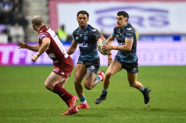 Leoparlar 'dan David Armstrong, 13 Şubat 2025' te İngiltere 'nin Wigan kentindeki The Brick Community Stadyumu' nda oynanan Wigan Warriors - Leigh Leopards maçında ilk raundu kazandı.