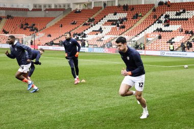 Blackpool 'dan Elkan Baggott 15 Şubat 2025' te Bloomfield Road, Blackpool 'da oynanan Sky Bet 1 karşılaşmasında maç öncesi ısınma maçında Blackpool Mansfield Town' a karşı