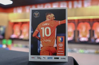 Sonny Carey of Blackpool on the front cover of todays match day program during the Sky Bet League 1 match Blackpool vs Mansfield Town at Bloomfield Road, Blackpool, United Kingdom, 15th February 2025 clipart