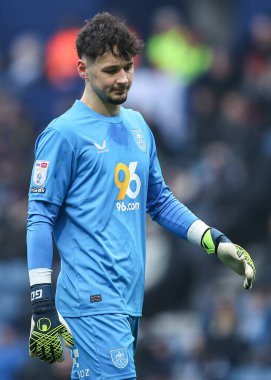 Burnley 'den James Trafford, 15 Şubat 2025' te İngiltere 'nin Deepdale kentinde oynanan ve Preston North End' in Burnley 'e karşı oynadığı Gökyüzü İddia Şampiyonası karşılaşmasında kaçırdığı şans sonrasında üzüldü.