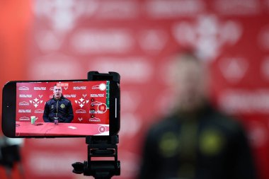 Danny McGuire Head Coach of Castleford Tigers speaks int the post match press conference during the Betfred Super League Round 1 match Hull KR vs Castleford Tigers at Sewell Group Craven Park, Kingston upon Hull, United Kingdom, 14th February 2025 clipart