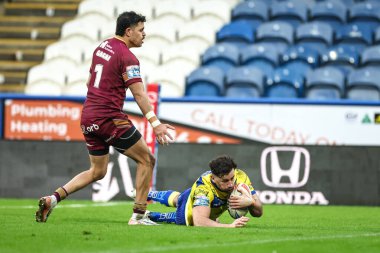 Warrington Wolves 'tan Toby King, 16 Şubat 2025' te John Smith 'in Stadyumu' nda oynanan Huddersfield Giants vs Warrington Wolves maçında Betfred Süper Lig Turu 'nu deniyor.