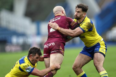 Adam Swift, John Smith Stadyumu, Huddersfield, Birleşik Krallık, 16 Şubat 2025 'te oynanan Betfred Süper Lig 1. Raundunda Stefan Ratchford ve Toby King tarafından yenildi.