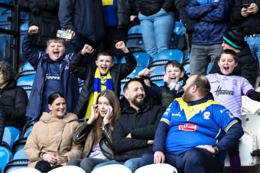 Warrington taraftarları 16 Şubat 2025 'te İngiltere' nin Huddersfield Stadyumu 'nda oynanan Betfred Süper Lig 1. Raundunda Huddersfield Giants ve Warrington Wolves maçında yerlerini aldılar.