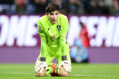 Sheffield 'li James Beadle Wednesday, Burnley' nin 21 Şubat 2025 'te İngiltere' nin Burnley kentindeki Turf Moor 'da oynadığı Gökyüzü İddia Şampiyonası maçında 4. Burnley golünün ardından üzgün görünüyor.