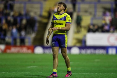 Warrington Wolves takımından Matty Ashton, 21 Şubat 2025 'te İngiltere' nin Warrington şehrinde oynanan Betfred Süper Lig karşılaşmasında Warrington Wolves, Catalans Dragons 'a karşı.