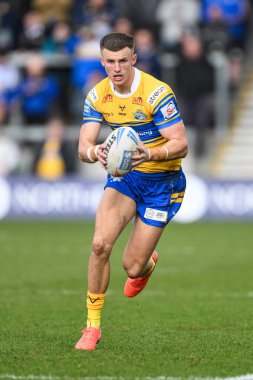 Leeds Rhinos takımından Ash Handley, 22 Şubat 2025 'te İngiltere' de oynanan Betfred Süper Lig karşılaşmasında Salford Red Devils, Leeds Gergedan 'a karşı oynuyor.