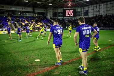 Warrington Wolves 'tan Joe Philbin, 21 Şubat 2025' te İngiltere 'nin başkenti Warrington' da oynanan Betfred Süper Lig 2. Raundunda Lilly Günü anısına Warrington Wolves 'a karşı Catalans Dragons maçında bir numara yaptı.