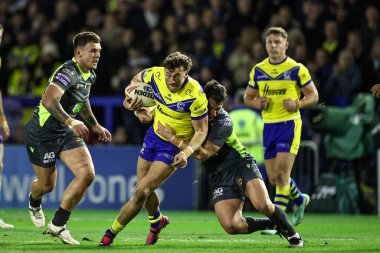 Warrington Wolves 'tan Matty Ashton, 21 Şubat 2025' te Warrington, İngiltere 'deki Luke Littler Stadyumu' nda oynanan Betfred Süper Lig karşılaşmasında Katalan Ejderhaları 'ndan Benjamin Garcia tarafından yenildi.