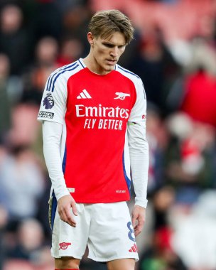 Arsenal 'den Martin Odegaard, 22 Şubat 2025' te Birleşik Krallık 'ın Emirates Stadyumu' nda oynanan Premier League karşılaşması Arsenal - West Ham United maçının yenilgisi üzerine üzgün görünüyor.