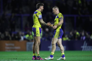 Warrington Wolves 'tan Matty Ashton ve Warrington Wolves' tan Matt Dufty, 21 Şubat 2025 'te İngiltere' nin başkenti Warrington 'daki Luke Littler Stadyumu' nda oynanan 2.