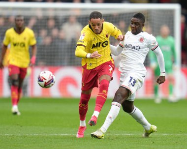 Luton Town 'dan muhteşem Nakamba, 23 Şubat 2025' te Watford-Luton Town maçında Watford-Luton Town karşılaşmasında Watford 'lu Thomas Ince' e meydan okuyor.