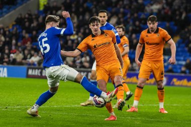 Cardiff City takımından Cian Ashford, 25 Şubat 2025 'te Cardiff City, Cardiff City Stadyumu' nda oynanan Sky Bet Şampiyonası karşılaşmasında Hull City takımından Alfie Jones 'u yere serdi.