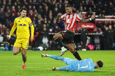 Leeds United takımından Illan Meslier, Sheffield United 'ın 24 Şubat 2025' te Bramall Lane, Sheffield, İngiltere 'de oynanan Sheffield United-Leeds maçında Sheffield United' ın ayaklarının dibinde kurtarıyor.