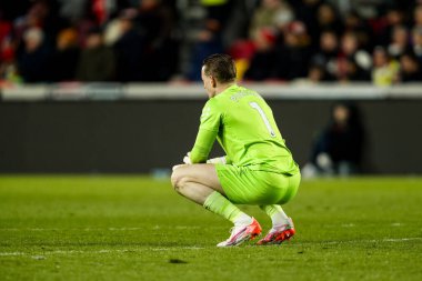 Everton 'dan Jordan Pickford, 26 Şubat 2025' te İngiltere 'nin Gtech Community Stadyumu' nda oynanan Premier League karşılaşmasında üzgün görünüyor.