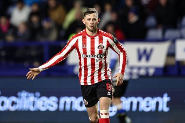 Sunderland 'dan Alan Browne takımına 28 Şubat 2025' te Sheffield Wednesday 'in Hillsborough, Sheffield' da Sunderland 'a karşı oynadığı Gökyüzü İddia Şampiyonası maçında talimatlar veriyor.