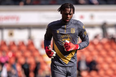 Wrexham AFC 'den Arthur Okonkwo, Wrexham-Bolton Wanderers maçı öncesinde 1 Mart 2025' te SToK Cae Ras, Wrexham, İngiltere