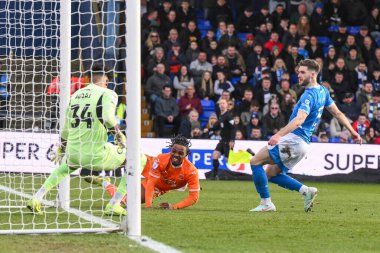 Blackpool 'dan Niall Ennis gol atmasına karşın, Stockport County' den Corey Addai tarafından 1 Mart 2025 'te Stockport County' nin Edgeley Park Stadyumu 'ndaki Blackpool maçında kurtarıldı.