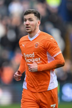 Blackpool takımından Lee Evans 1 Mart 202 'de Stockport County' ye karşı Stockport Park Stadyumu 'nda oynanan maçta