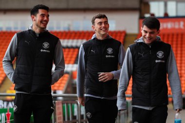 Blackpool 'dan Harry Tyrer takım arkadaşlarıyla birlikte 4 Mart 2025' te Bloomfield Road, Blackpool 'da oynanan Blackpool-Peterborough United maçı öncesinde geldi.
