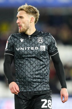 Wrexham takımından Sam Smith 4 Mart 2025 'te John Smith Stadyumu' nda Huddersfield Town 'a karşı Wrexham maçında