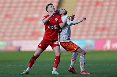 Barnsley FC 'den Davis Keillor-Dunn. Blackpool F.C. 'den Hayden Coulson' a baskı yapıyor. Sky Bet Ligi 1 maçında Barnsley, Blackpool 'a karşı Oakwell, Barnsley, İngiltere, 8 Mart 2025