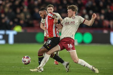 Sheffield United 'dan Tyrese Campbell ve Bristol City' den Rob Dickie 11 Mart 2025 'te Bramall Lane, Sheffield, İngiltere' de oynanan Sky Bet Şampiyonası maçında top için mücadele ettiler.
