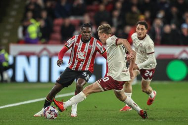 Sheffield United takımından Femi Seriki, 11 Mart 2025 'te Bramall Lane, Sheffield, İngiltere' de oynanan Gökyüzü İddia Şampiyonası maçında Bristol City ile Sheffield United arasında oynanan karşılaşmada Bristol City 'den Sam Bell tarafından yenildi.
