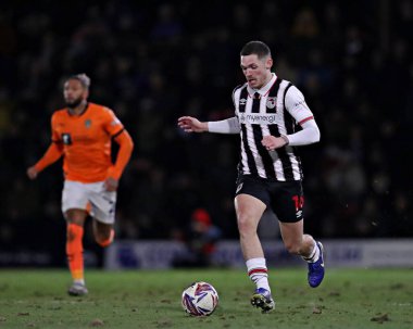 Grimsby Town takımından Callum Ainley 11 Mart 2025 'te Blundell Park, Cleethorpes' ta Grimsby Town 'a karşı Notts County maçında