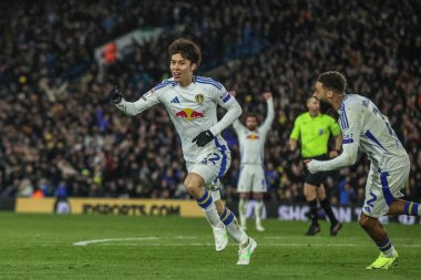 Leeds United takımından Ao Tanaka, 12 Mart 2025 'te Leeds, İngiltere' de Leeds Road 'da oynanan Sky Bet Şampiyonası maçında 2-0' lık galibiyetini kutluyor.