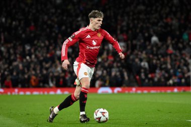 Manchester United takımından Alejandro Garnacho, UEFA Avrupa Ligi 'nde son 16 maçta Manchester United' ın Real Sociedad 'a karşı oynadığı Old Trafford, Manchester, İngiltere' de 13 Mart 2025 'te topa vuruyor.