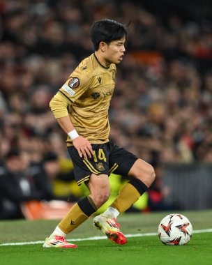 Real Sociedad 'dan Takefusa Kubo, UEFA Avrupa Ligi' nde son 16 maç Manchester United 'ın Real Sociedad' a karşı Old Trafford, Manchester, İngiltere 'de 13 Mart 2025' te oynadığı maçta topa ilk vuruşunu yaptı.