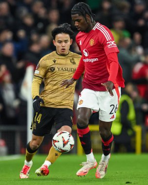 Manchester Cenneti United, Real Sociedad 'dan Takefusa Kubo' nun baskısı altında UEFA Avrupa Ligi Son 16 maç Manchester United 'ın Real Sociedad' a karşı Old Trafford, Manchester, İngiltere 'de, 13 Mart 2025