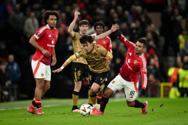 Real Sociedad 'dan Takefusa Kubo, Manchester United' ın 13 Mart 2025 'te Old Trafford, Manchester, İngiltere' de oynadığı Manchester United - Real Sociedad maçında Manchester United 'dan Casemiro' nun mücadelesinden kaçtı.