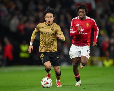 Real Sociedad 'dan Takefusa Kubo, UEFA Avrupa Ligi' nde son 16 maç Manchester United 'ın Real Sociedad' a karşı Old Trafford, Manchester, İngiltere 'de 13 Mart 2025' te oynadığı maçta topa ilk vuruşunu yaptı.