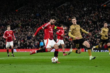 Manchester United 'dan Bruno Fernandes 3-1 önde ve UEFA Avrupa Ligi' nde son 16 maçta Manchester United 'ın Real Sociedad' a karşı Old Trafford, Manchester, İngiltere 'de 13 Mart 2025' te yaptığı maçta hat-trick yaptı.
