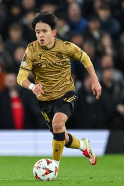 Real Sociedad 'dan Takefusa Kubo, UEFA Avrupa Ligi' nde son 16 maç Manchester United 'ın Real Sociedad' a karşı Old Trafford, Manchester, İngiltere 'de 13 Mart 2025' te oynadığı maçta topa ilk vuruşunu yaptı.