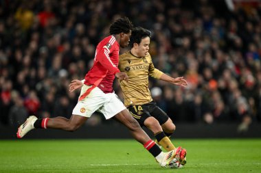 Real Sociedad 'dan Takefusa Kubo, UEFA Avrupa Ligi' nden Patrick Dorgu tarafından 13 Mart 2025 'te Old Trafford, Manchester, Birleşik Krallık' ta Manchester United 'ın Real Sociedad' a karşı oynadığı maçta yenildi.