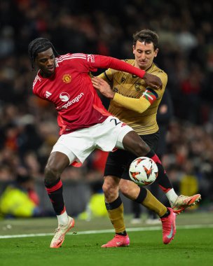 Manchester United 'dan Ayden Heaven ve Real Sociedad' dan Mikel Oyarzabal, UEFA Avrupa Ligi 'nde son 16 maç Manchester United' ın Real Sociedad 'a karşı Old Trafford, Manchester, Birleşik Krallık' ta 13 Mart 2025 'te oynadıkları maçta top için mücadele ettiler.