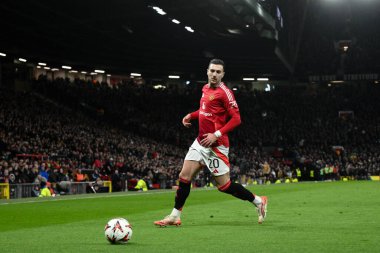 Manchester United takımından Diogo Dalot topu UEFA Avrupa Ligi 'nde son 16 maç Manchester United ile Old Trafford, Manchester, Birleşik Krallık' ta Real Sociedad maçında aldı.