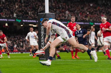 İngiltere 'den Tommy Freeman, İngiltere' nin Cardiff şehrindeki Principality Stadyumu 'nda oynanan 2025 Guinness 6 Milletler Maçı' nda skoru belirledi.