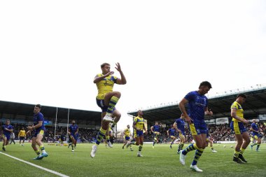 Warrington Wolves oyuncuları maç öncesi ısınma maçında Widnes Vikings vs Warrington Wolves 'a karşı DCBL Stadyumu, Widnes, Birleşik Krallık, 15 Mart 2025