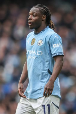 Manchester City 'den Jrmy Doku Premier League maçı sırasında Manchester City, Etihad Stadyumu' nda Brighton ve Hove Albion 'a karşı, 15 Mart 2025