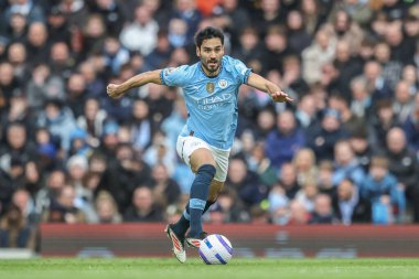 Manchester City 'den Ikay Gndoan, Premier League maçında topu Manchester City' ye karşı Brighton ve Hove Albion 'a karşı Etihad Stadyumu' nda 15 Mart 2025 'te atıyor.