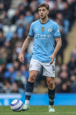 Manchester City - Manchester City maçı sırasında Nico Gonzlez ve Hove Albion Etihad Stadyumu, Manchester, İngiltere, 15 Mart 2025