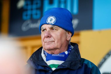 Taraftarlar Cledara Abbey Stadyumu 'na, 15 Mart 2025' te Cledara Abbey Stadyumu 'nda oynanan Cambridge United-Peterborough maçı öncesinde geldiler.