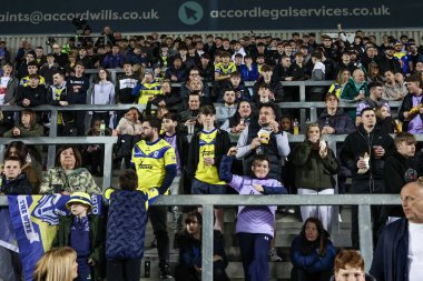 Warrington taraftarları maç için 5. Betfred Süper Lig karşılaşması sırasında St Helens vs Warrington Wolves 'a karşı St Helens Stadyumu, St Helens, İngiltere, 21 Mart 2025